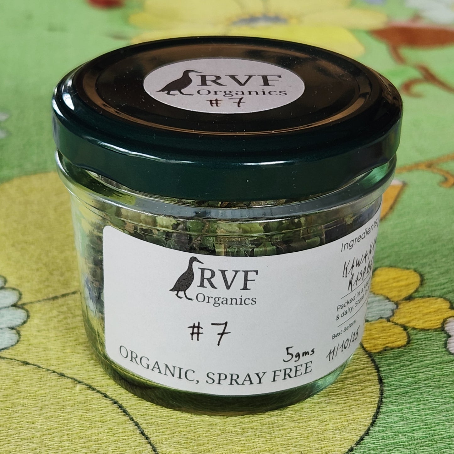 Jar of RVF Organics #7 on a floral background